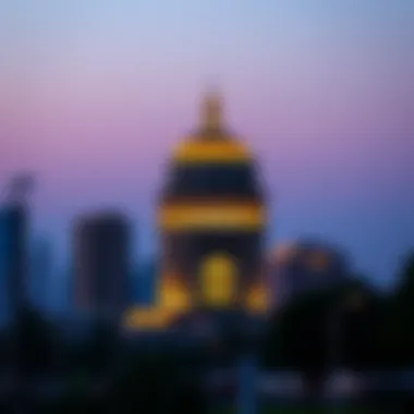 Evening shot of Dome Tower illuminated against the Dubai skyline