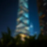 The Torch Tower illuminated at night showcasing its unique design